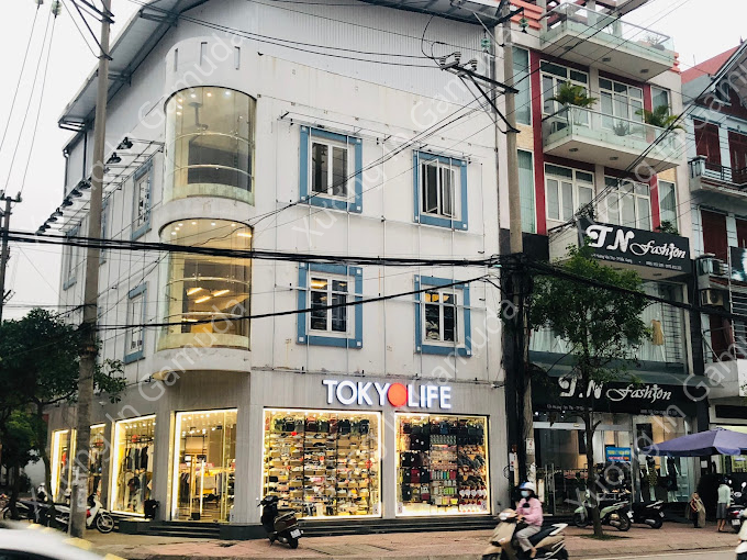 Rèm cuốn in logo In UV trên chất liệu polyester cản sáng cản nhiệt hiệu quả