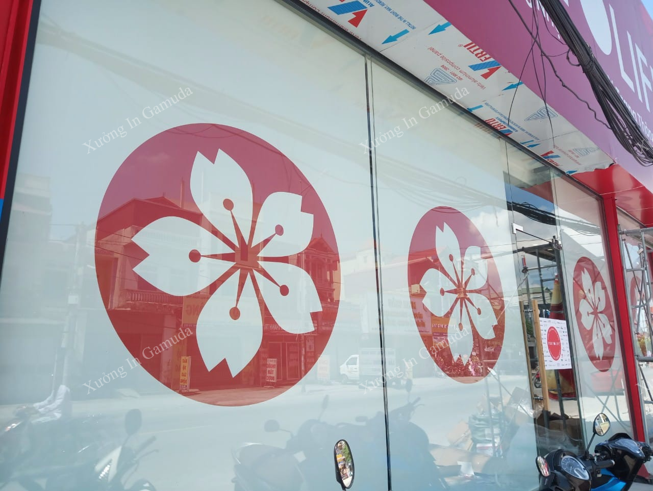 Logo hình hoa anh đào biểu tượng của xứ 